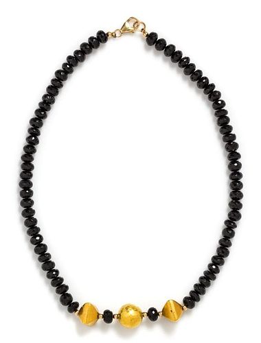 A Yellow Gold and Onyx Bead Necklace, 28.70 dwts.