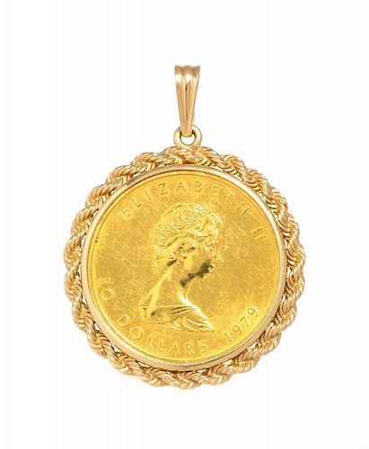 A 14 Karat Yellow Gold and Canada $50 1979 Maple Leaf Coin Pendant, 24.90 dwt.