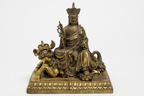 Chinese Brass Sculpture of Figure on Foo Dog