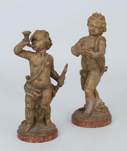 Two Continental Molded Terracotta Figures of Putti