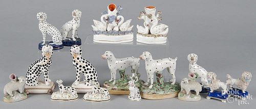 Collection of Staffordshire dogs and spill vases
