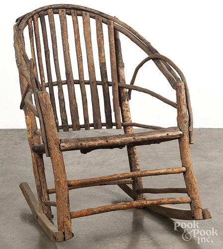 Primitive Adirondack rocking chair.