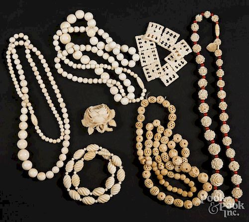 Group of Chinese carved ivory jewelry, ca.1900.
