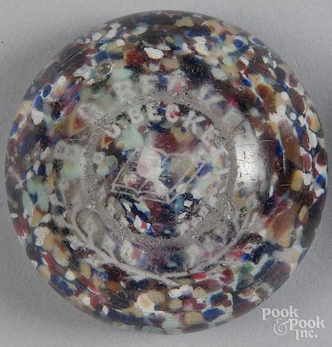 Two white frit paperweights