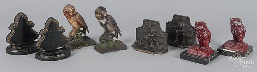 Four pair of bronze, iron, and white metal bookend