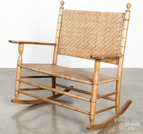 Love seat rocker with a rush seat.