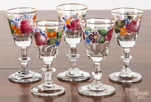 Five enameled mold blown wine glasses, 19th c.