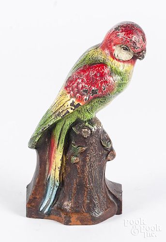 Cast iron parrot on a stump doorstop, 8'' h.