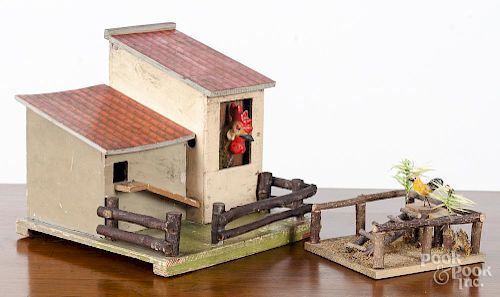 Composition rooster in hen house squeak toy