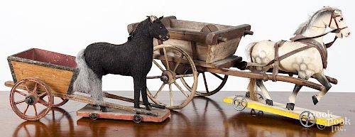 Two horse drawn cart pull toys, 16'' l. and 19'' l.