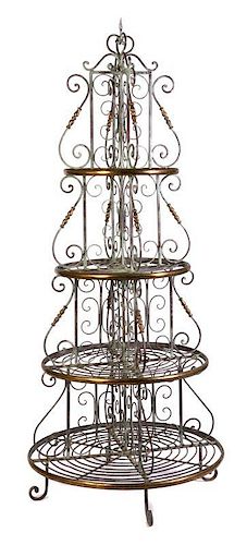 A FRENCH CIRCULAR IRON BAKER'S RACK STYLE STAND