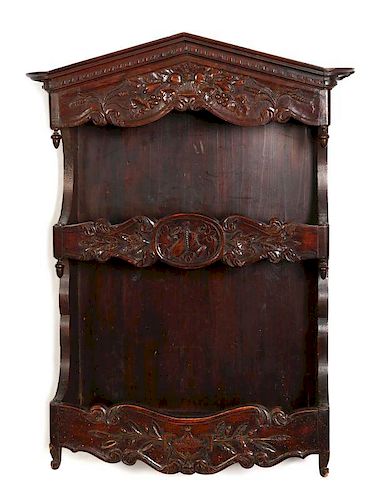 A 19TH CENTURY FRENCH CARVED ESTAGNIER PLATE RACK