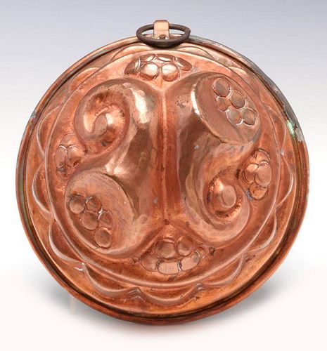 AN ANTIQUE COPPER FOOD MOLD