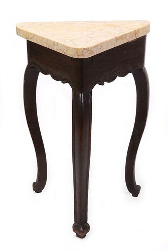AN OAK TRILATERAL STAND TABLE WITH MARBLE TOP