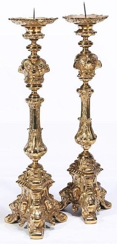 A PAIR OF EARLY 20TH C. BRASS ALTAR STICKS