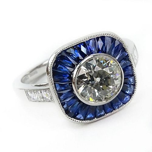 Approx. .95 Carat Old European Cut Diamond, .87 Carat Calibre Cut Sapphire and Platinum Ring..