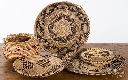 Five Southwest coiled basketry trays and bowls
