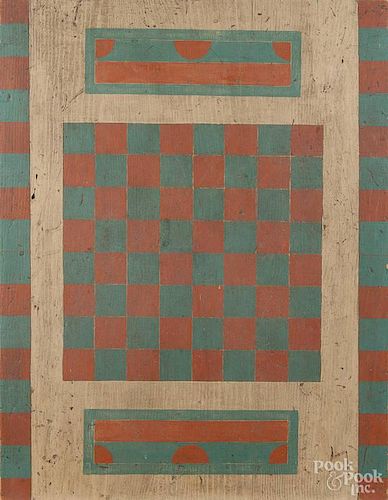 Painted pine gameboard, 19th c., with a later blue, cream, and salmon surface, 23 1/2'' x 18''.