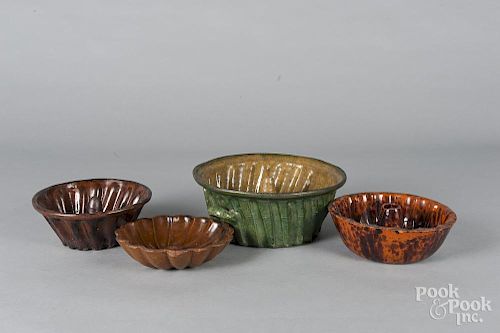 Four redware food molds