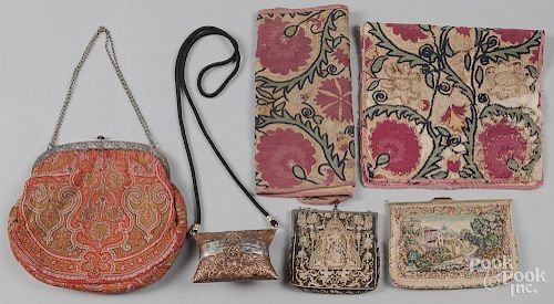 Two crewelwork panels, together with four purses.