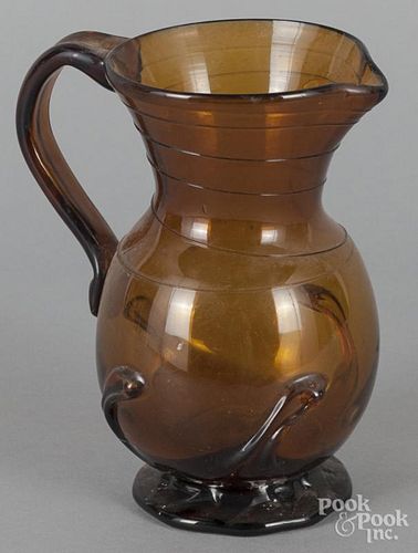 Blown amber glass pitcher