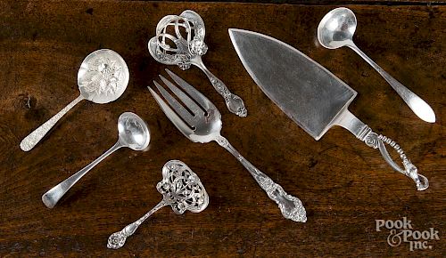 Seven sterling silver serving utensils