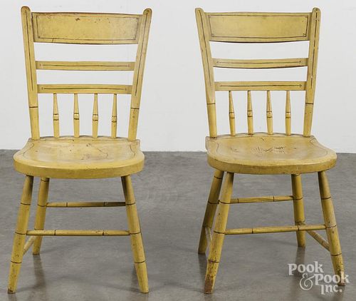 Pair of yellow painted plank bottom chairs