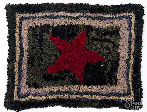 Hooked rug with star
