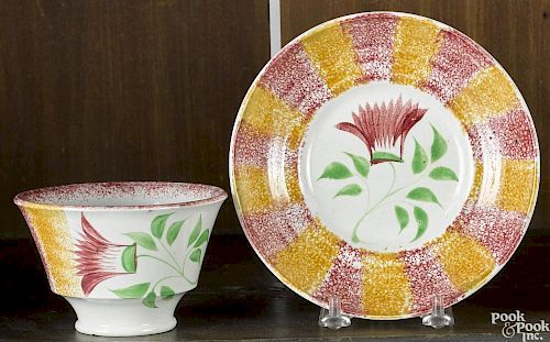 Yellow spatter cup and saucer with thistle.
