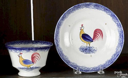 Blue spatter cup and saucer with rooster.