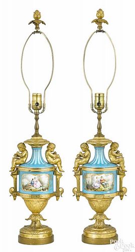 Pair of French porcelain and gilt bronze garniture