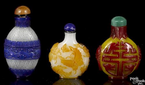 Three Chinese two-color glass snuff bottles