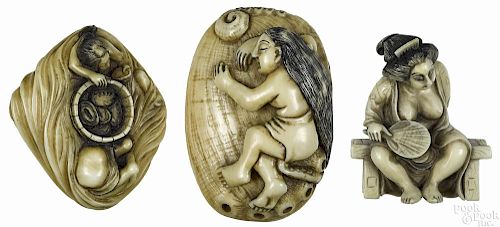 Three Japanese carved ivory nude female netsukes
