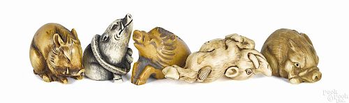Five Japanese carved ivory wild boar netsukes