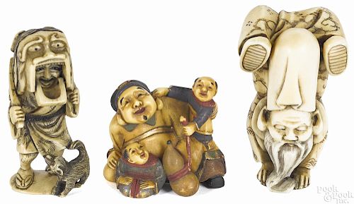 Three Japanese carved ivory figural netsukes