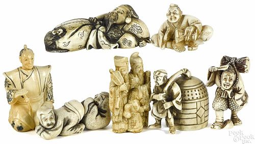 Seven Japanese carved ivory figural netsukes