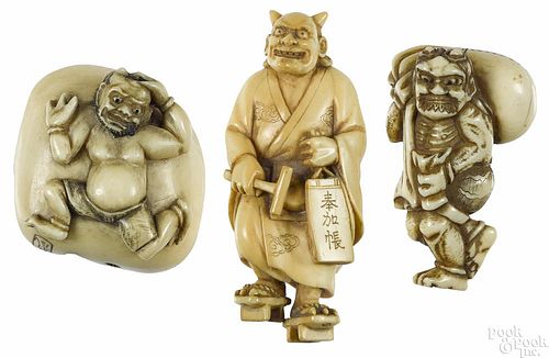 Three Japanese carved ivory demon netsukes