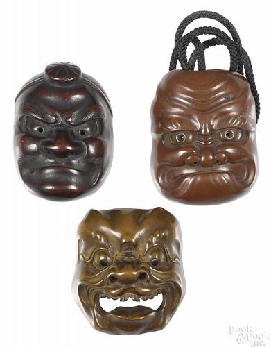 Three Japanese mask netsukes