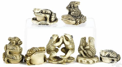 Seven Japanese carved ivory frog netsukes