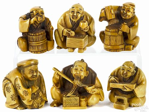 Six Japanese carved ivory seated figure netsukes,