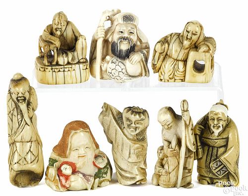 Eight Japanese carved ivory scholar netsukes, fe