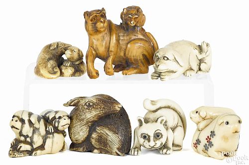 Seven Japanese carved ivory animal netsukes, to