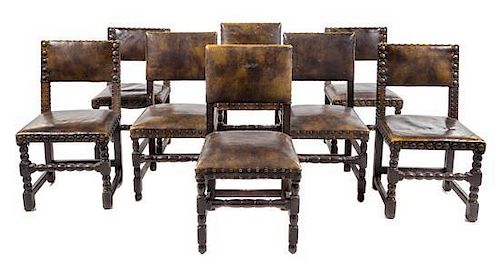 A Group of Eight French Renaissance Revival Oak Chairs Height 37 inches.