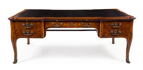 * A Louis XV Style Kingwood and Parquetry Bureau Plat Height 30 1/2 x width 78 1/2 x depth 41 1/4 inches.