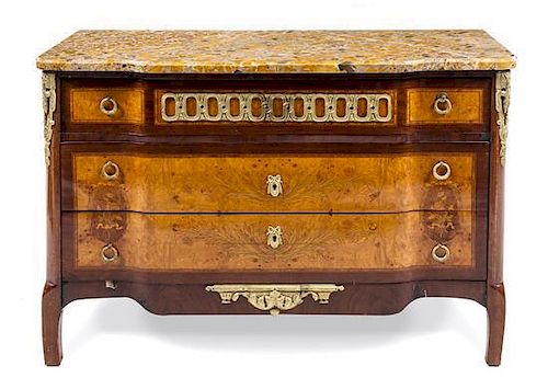 * A Louis XVI Style Marquetry Decorated Commode Height 29 3/8 x width 43 5/8 x depth 19 1/4 inches.