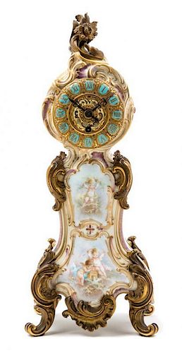 * A French Gilt Bronze Mounted Porcelain Clock Height 13 3/4 inches.
