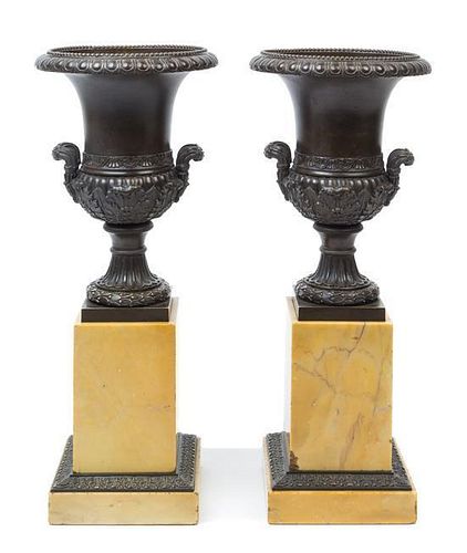 A Pair of Neoclassical Patinated Bronze Urns Height 14 7/8 inches.