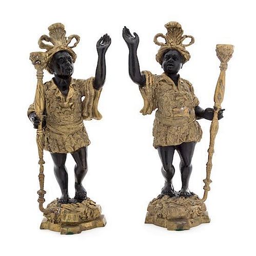A Pair of Gilt and Patinated Cast Metal Figures Height of taller 16 1/2 inches.
