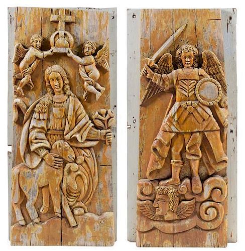 A Pair of Continental Carved Panels Height 67 1/4 x width 28 1/2 inches.