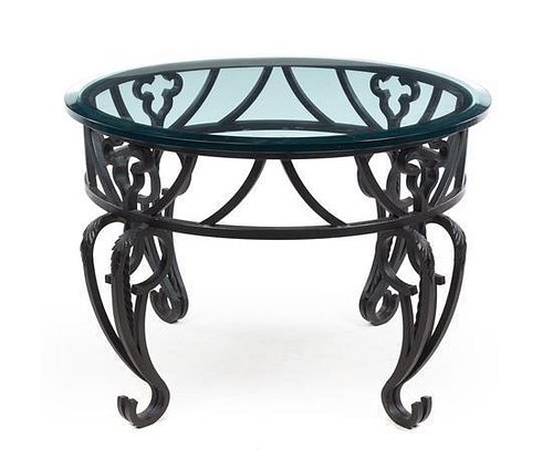 An Iron and Glass Center Table Height 23 3/4 inches.